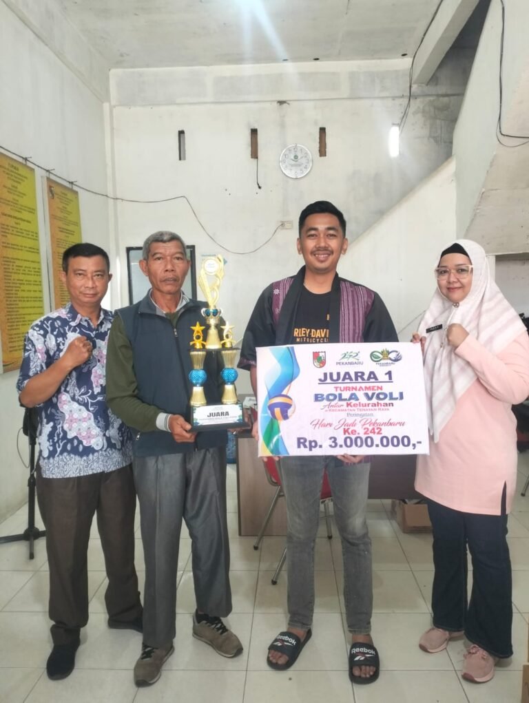 Tim Putri Bambu Kuning Raih Juara 1 Turnamen Olahraga Antar-Kelurahan Kecamatan Tenayan Raya